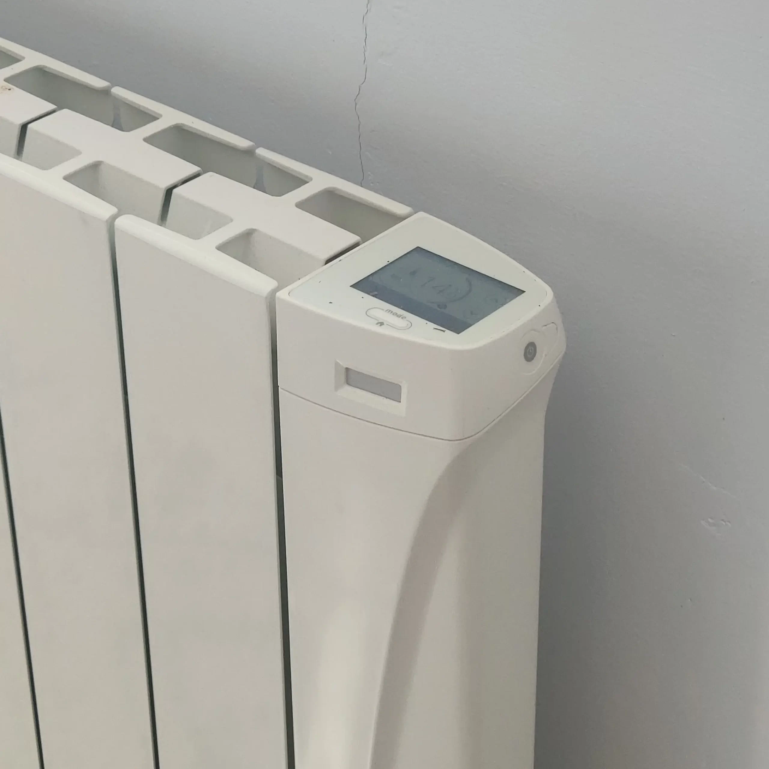 IntelliHeat electric heating retrofit replacing legacy oil boiler systems